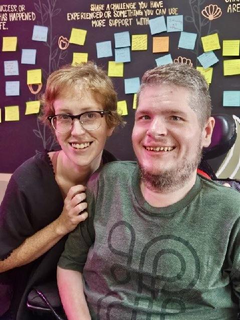 Me in a green tee with a cute ginger with glasses. I can say that because she’ll never see this alt text. While we’re here I should say my eyes are wide open and I’m grinning like I’ve just done hard stims and I’m about to commit crimes. Anyway she was nice it was fun.
